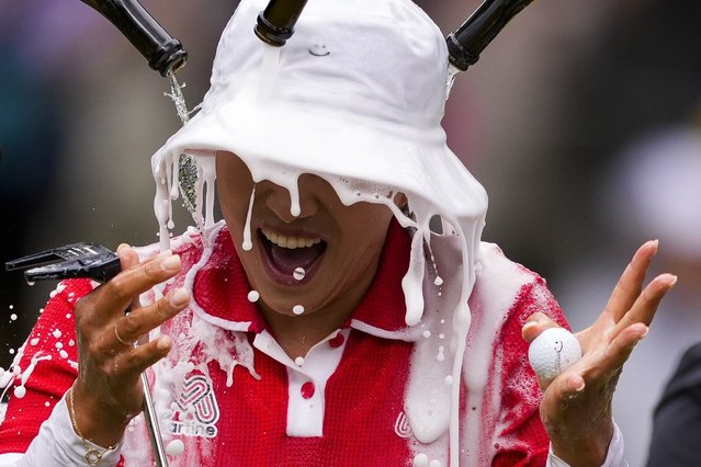Amy Yang, of South Korea, is doused after winning the Women's PGA Championship golf tournament at Sahalee Country Club, Sunday, June 23, 2024, in Sammamish, Wash. (Photo by Lindsey Wasson/AP Photo)