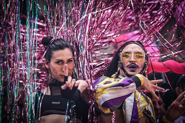 Participants attend the 32nd edition of the LGBT+ pride march in Buenos Aires, Argentina on November 4, 2023. The motto of this year's mobilization is “No to more adjustments, no to one less right. Anti-Discrimination Law, Comprehensive Trans Law now! Let's stop the anti-rights!”, in favor of the rights of the members of the diverse community. (Photo by Juan Ignacio Roncoroni/EPA/EFE)