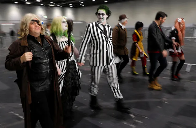 Visitors in costume arrive at the London Comic Con, at the ExCel exhibition centre in east London, Britain on October 27, 2017. (Photo by Peter Nicholls/Reuters)