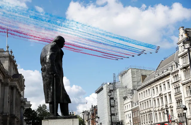 The Red Arrows and La Patrouille de France perform a flypast over a statue of Winston Churchill, during a meeting of British Prime Minister Boris Johnson and French President Emmanuel Macron in London, Britain, June 18, 2020. (Photo by Peter Nicholls/Reuters)
