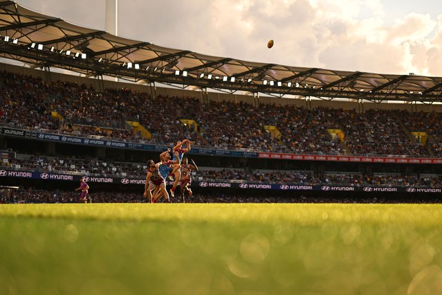 A general view is seen as players compete for the ball during the round ten AFL match between Brisbane Lions and Narrm (Melbourne Demons) at The Gabba, on May 18, 2025, in Brisbane, Australia. (Photo by Albert Perez/AFL Photos via Getty Images)