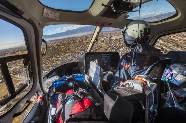 In this Monday, November 6, 2017 photo, pilot Shawn McFarland pilots a Flight for Life helicopter carrying Paul Oldfield, a registered nurse, as they take off from St. Francis Memorial Hospital in Colorado Springs, Colo. They help to serve those in need of medical attention and to be airlifted to hospitals including the St. Francis Memorial Hospital. (Photo by Dougal Brownlie/The Gazette via AP Photo)