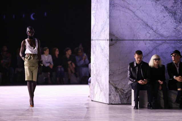 A model presents a creation by designer Anthony Vaccarello as part of his Spring/Summer 2024 Women's ready-to-wear collection show for fashion house Saint Laurent during Paris Fashion Week in Paris, France on September 26, 2023. (Photo by Johanna Geron/Reuters)