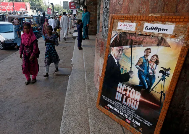 An advertising poster for an Indian film is seen outside a movie theater in Karachi, Pakistan, September 30, 2016. (Photo by Akhtar Soomro/Reuters)