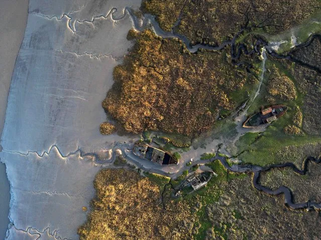 In this aerial view shipwrecked boats sit in a mudbank in the Wyre Estuary where the police search for missing Nicola Bulley continues at the mouth of the river that meets Morecambe Bay on February 09, 2023 in Fleetwood, England. Police are continuing to look for the missing Inskip woman, Nicola Bulley, 45, and have widened their search towards the Morecambe Bay end of the River Wyre. Nicola hasn't been seen since taking her spaniel for a walk by the River Wyre on the morning of Friday 27th January. (Photo by Christopher Furlong/Getty Images)