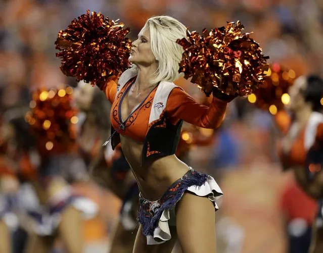 A Denver Broncos cheerleader performs during the second half of an NFL preseason football game against the Los Angeles Rams, Saturday, August 27, 2016, in Denver. (Photo by Joe Mahoney/AP Photo)