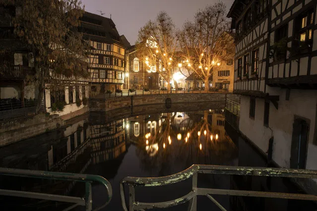 Christmas lightings are pictured where the Christmas market usually takes place, Friday, November 27, 2020 in Strasbourg, eastern France. Due to the COVID-19 pandemic, the well-known festive market will not be taking place this year. (Photo by Jean-Francois Badias/AP Photo)