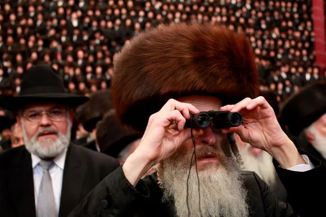 Ultra-orthodox Jewish wedding in Israel. Tens of thousands of Ultra-Orthodox Jews of the Belz Hasidic dynasty gather at the wedding ceremony of Rabbi Shalom Rokach in Kiryat Belz, in Jerusalem, on May 22, 2013. Around 25,000 ultra-orthodox Jews took part, making it one of the biggest weddings of the past few years. (Photo by Gil Cohen)