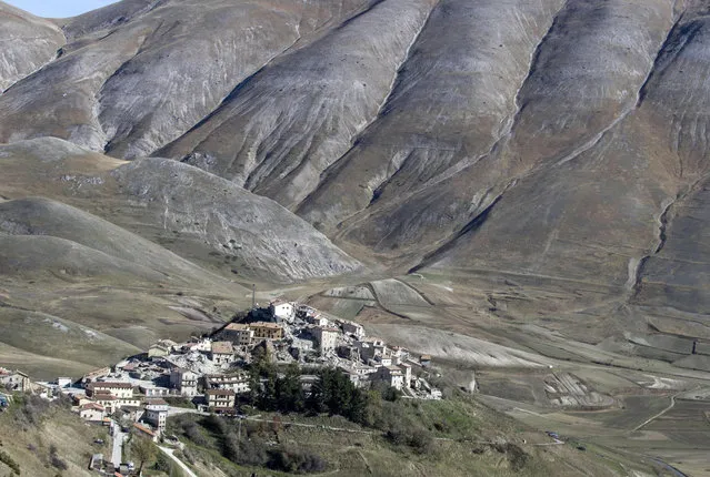 A view of Castelluccio di Norcia, Italy, Tuesday, November 1, 2016. Earthquake aftershocks gave central Italy no respite on Tuesday, haunting a region where thousands of people were left homeless and frightened by a massive weekend tremor that razed centuries-old towns. (Photo by Massimo Percossi/ANSA via AP Photo)