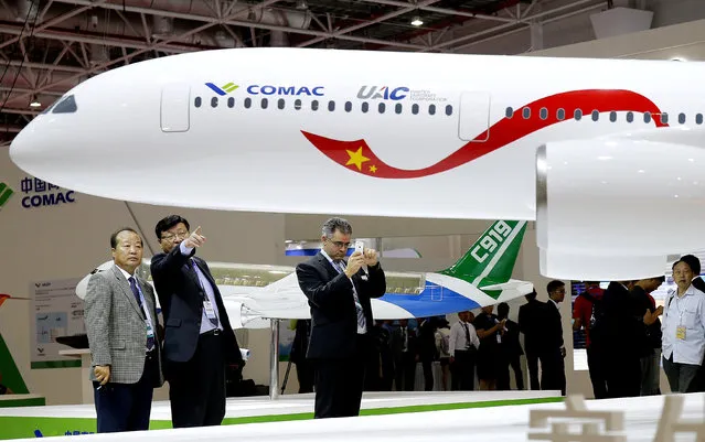 A model of a widebody jet, which is planned to be developed by Commercial Aircraft Corporation of China (COMAC) and Russia's United Aircraft Corporation (UAC) is presented at an air show, the China International Aviation and Aerospace Exhibition, in Zhuhai, Guangdong Province, China, November 2, 2016. (Photo by Reuters/China Daily)