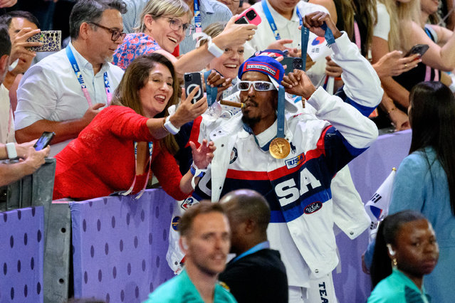 A team USA athlete poses for pictures with the audience during the closing ceremony of the Paris 2024 Olympic Games at the Stade de France, in Saint-Denis, in the outskirts of Paris, on August 11, 2024. (Photo by Maxim Thore/BILDBYRÅN/Rex Features/Shutterstock)