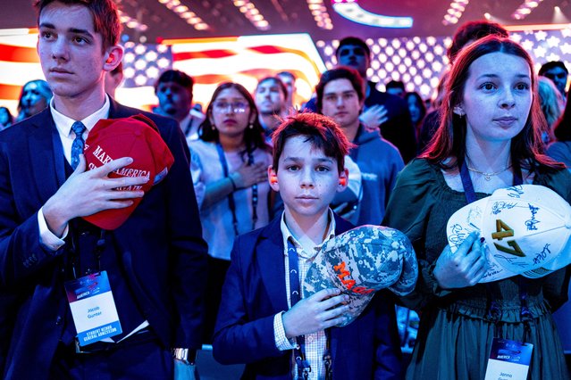 Attendees recite the pledge of allegiance during AmericaFest, the first Turning Point USA summit since the death of Charlie Kirk, in Phoenix, Arizona, U.S. December 19, 2025. (Photo by Cheney Orr/Reuters)