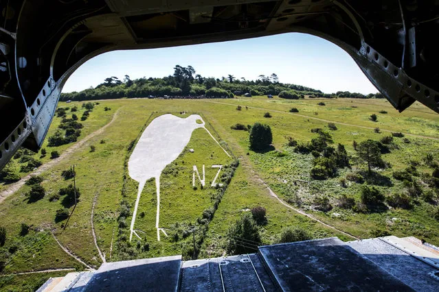 A handout photo made available by the British Ministry of Defence showing restoration work that was carried out on the Bulford Kiwi, chalk monument, on Beacon Hill,, Bulford, Salisbury Plain, west England, 29 June 2018, (issued 02 July 2018). The historic chalk monument on Salisbury Plain has been restored by Defence Infrastructure Organisation (DIO) along with partners Landmarc Support Services (Landmarc), the Army, the New Zealand High Commission and local volunteers to restore the “Bulford Kiwi”, which was created in 1919 by soldiers from New Zealand at the end of World War I as they awaited their return home. The figure has recently become a scheduled monument, which means it is recognised as a nationally important archaeological site and it is now protected from destruction or change. (Photo by Sac Pippa Fowles (RAF)/EPA/EFE)