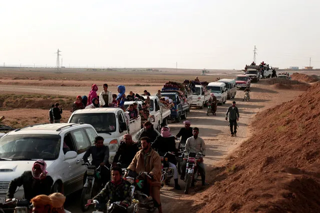 Residents of Hisha return to their town, after the Syrian Democratic Forces (SDF) took control of the area from Islamic State militants, in the northern Raqqa countryside, Syria November 14, 2016. (Photo by Rodi Said/Reuters)