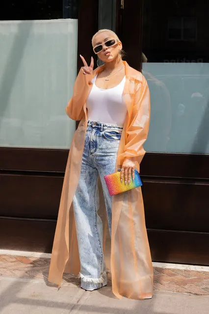 American singer-songwriter Cristina Aguilera leaves her hotel for a day out in New York City on June 27, 2023 wearing a colorful purse and jacket. (Photo by Wavy Peter/Splash News and Pictures)