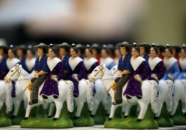 Santons, the typical figurines from Provence, are displayed at the Marcel Carbonel's Santon factory in Marseille, November 28, 2016. (Photo by Jean-Paul Pelissier/Reuters)