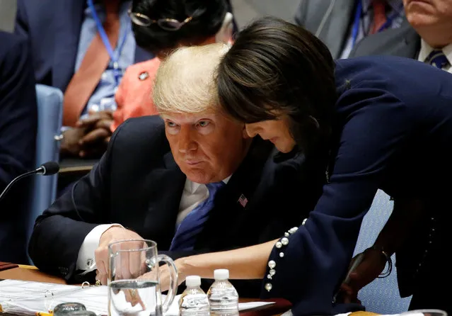 U.S. President Donald Trump and U.S. Ambassador to the United Nations Nikki Haley confer during a meeting of the United Nations Security Council held during the 73rd session of the United Nations General Assembly at U.N. headquarters in New York, U.S., September 26, 2018. (Photo by Eduardo Munoz/Reuters)