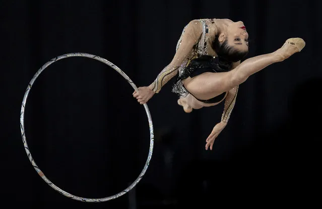 In this Tuesday, October 9, 2018 photo, Brazil's Maria Eduarda De Almeida Arakaki competes in the Rhythmic Gymnastics Individual All-Around at the America Pavilion in Youth Olympic Park at the Youth Olympic Games in Buenos Aires, Argentina. (Photo by Jed Leicester/OIS/IOC via AP Photo)