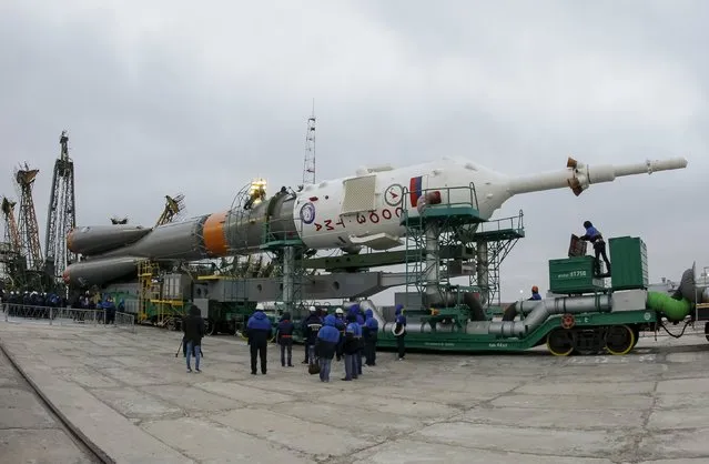 The Soyuz TMA-20M for the next International Space Station (ISS) crew of Jeff Williams of the U.S. and Oleg Skriprochka and Alexey Ovchinin of Russia is transported from an assembling hangar to the launchpad ahead of its launch, scheduled on March 19, at the Baikonur cosmodrome in Kazakhstan March 16, 2016. (Photo by Shamil Zhumatov/Reuters)