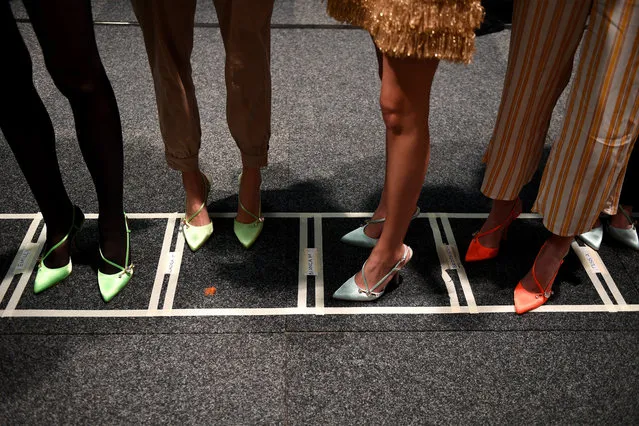 Models prepare backstage ahead of the Alice McCall show during Mercedes-Benz Fashion Week Australia in Sydney, Australia, 14 May 2019. (Photo by Dan Himbrechts/EPA/EFE)