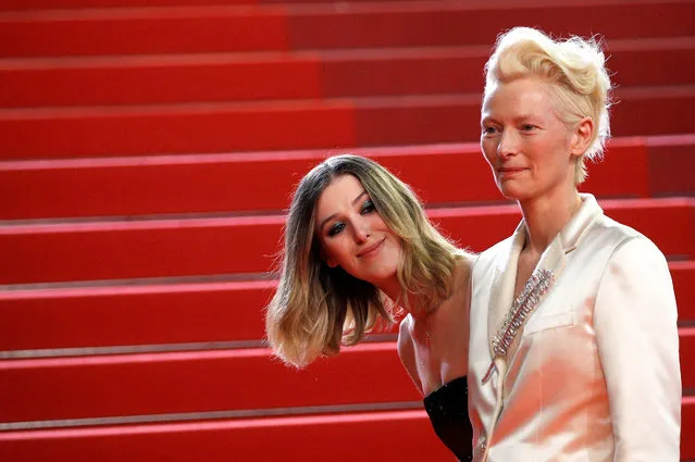 Actress Tilda Swinton, right, and her daughter Honor Swinton Byrne pose for photographers upon arrival at the premiere of the film “Parasite” at the 72nd international film festival, Cannes, southern France, Tuesday, May 21, 2019. (Photo by Stephane Mahe/Reuters)
