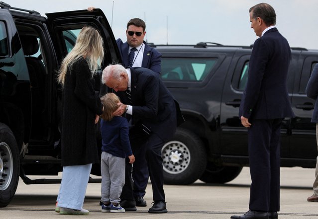 U.S. President Joe Biden embraces his grandson, Beau Biden, as his daughter-in-law, Melissa Cohen Biden, and his son, Hunter Biden, who earlier in the day was found guilty on all three counts in his criminal gun charges trial, stand by after the President arrived at the Delaware Air National Guard Base in New Castle, Delaware, U.S., June 11, 2024. (Photo by Anna Rose Layden/Reuters)