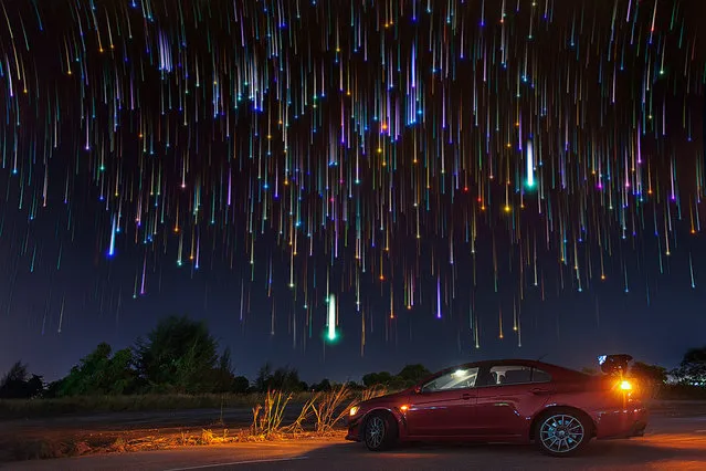 Star trails pictured at the backdrop of a car in Singapore by photographer Justin Ng. These astonishing images of night sky are captured by Singapore based photographer Justin Ng. The pictures were taken between November 2013 to January 2014. It show's star trail caused by the earth's rotation and also can be achieved by zooming the DSLR lens inward or outward in small steps using a dedicated motorized zooming device. (Photo by  Justin Ng/Barcroft Media)