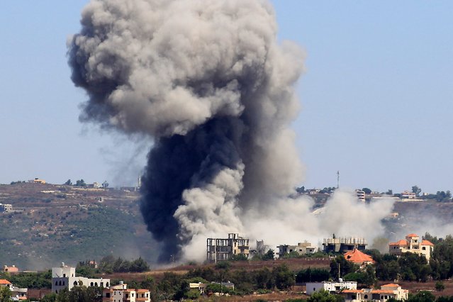 Smoke billows from the site of an Israeli airstrike in the southern Lebanese village of Jibbain on July 11, 2024. Israel and Lebanon's Hezbollah, an ally of Palestinian militant group Hamas, have exchanged near daily cross-border fire since the Gaza war erupted on October 7, stoking fears of an escalation into all-out war. (Photo by Kawnat Haju/AFP Photo)