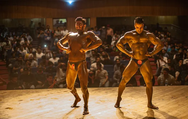 Kashmiri body builders strike a pose during the “Mr. Kashmir Body Building Competition” organized by Jammu and Kashmir Bodybuilding Association on May 13, 2017 in Srinagar, the summer capital of Indian administered Kashmir, India. Kashmirs top bodybuilders competed in the championship in the strife torn valley where indoor sports have received a boost in the recent years. Bodybuilding has evolved as a popular sport in Kashmir with hundreds of gyms flourishing in the region. (Photo by Yawar Nazir/Getty Images)