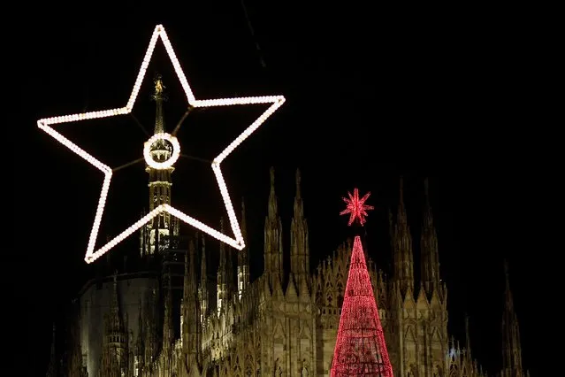 Christmas lights and a Christmas tree are pictured in Duomo Square in downtown Milan, Italy, December 6, 2019. (Photo by Flavio Lo Scalzo/Reuters)