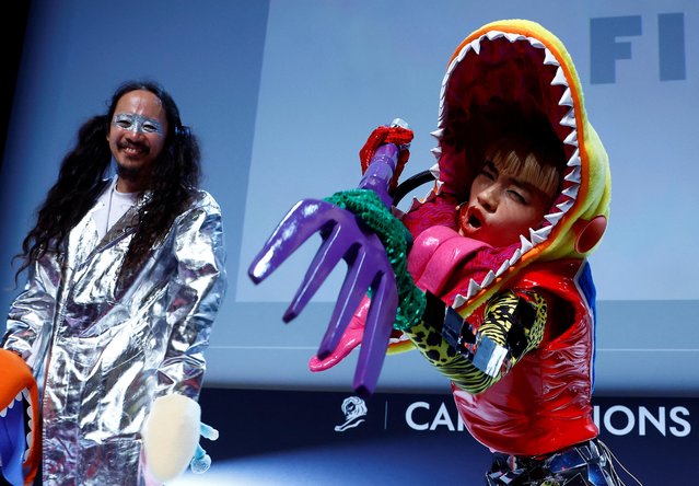 Performer and artist Aoi Yamada and film director Makoto Nagahisa perfom on stage during a conference at the Cannes Lions International Festival of Creativity in Cannes, France on June 21, 2023. (Photo by Eric Gaillard/Reuters)