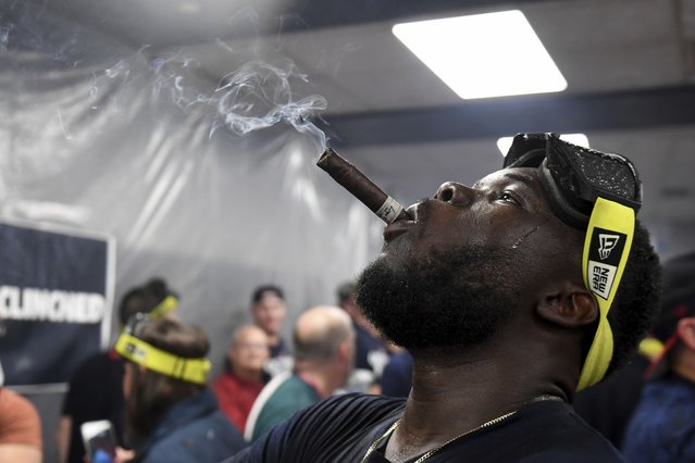 Cleveland Guardians' Jhonkensy Noel celebrates in the clubhouse after they defeated the Minnesota Twins to clinch a baseball playoff berth, Thursday, September 19, 2024, in Cleveland. (Photo by Nick Cammett/AP Photo)