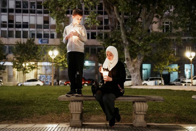 Protesters hold candles as they take part in a vigil in support of Palestinians, ahead of the one-year anniversary of Hamas' October 7 attack, in Buenos Aires, Argentina on October 6, 2024. (Photo by Irina Dambrauskas/Reuters)