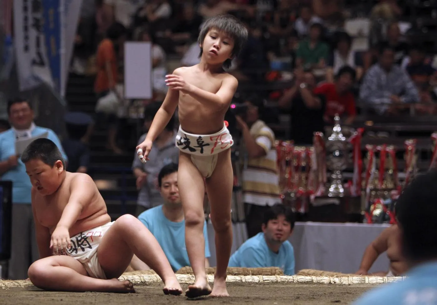 LaPresseIn this Sunday, July 29, 2012 photo, an elementary school sumo wres...