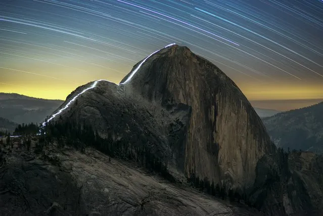 “People and Space”. Runner up: The Cable Route of Half Dome at Night by Kurt Lawson (USA) The photographer along with fellow astrophotographer Sean Goebel embarked on a mission to shoot a night hike up the Cable Route of Yosemite’s incredible Half Dome. Nearly clear skies allowed for the capture of the movement of the stars above this incredible landscape and shooting it at night allowed them to capture the path up Yosemite’s famous granite icon. Yosemite National Park, California, USA, 29 August 2016 Sony α7R camera, 100 mm f/2.8 lens, ISO 500, 64-minute exposure. (Photo by Kurt Lawson/Insight Astronomy Photographer of the Year 2017)
