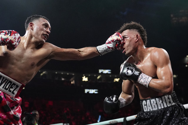 David Benavidez lands a left to David Morrell during a light heavyweight title boxing match Saturday, February 1, 2025, in Las Vegas. (Photo by John Locher/AP Photo)