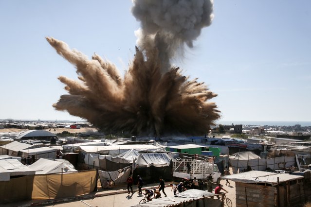 A view shows an explosion during an Israeli strike at a tent camp sheltering displaced people, in Khan Younis, southern Gaza Strip, on April 19, 2025. (Photo by AFP Photo/Stringer)