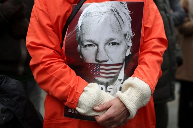 A supporter of WikiLeaks founder Julian Assange stands outside the high court on the day Assange appeals against his extradition to the United States, in London, Britain, on February 20, 2024. (Photo by Isabel Infantes/Reuters)