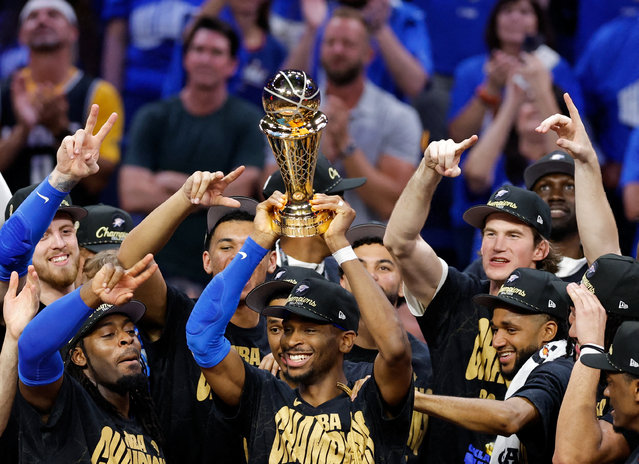 Oklahoma City Thunder guard Shai Gilgeous-Alexander (2) lifts the Larry O'Brien Championship Trophy as the Oklahoma City Thunder celebrate after winning game seven of the 2025 NBA Finals against the Indiana Pacers at Paycom Center in Oklahoma City, Oklahoma on June 22, 2025. (Photo by Alonzo Adams/Reuters)