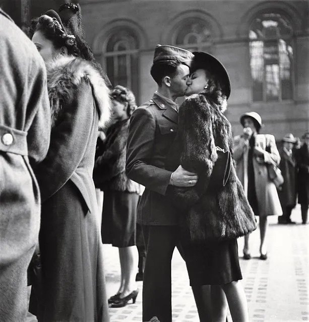 Couple in Penn Station sharing farewell kiss before he ships off to war during WWII. (Photo by Alfred Eisenstaedt/Time & Life Pictures)