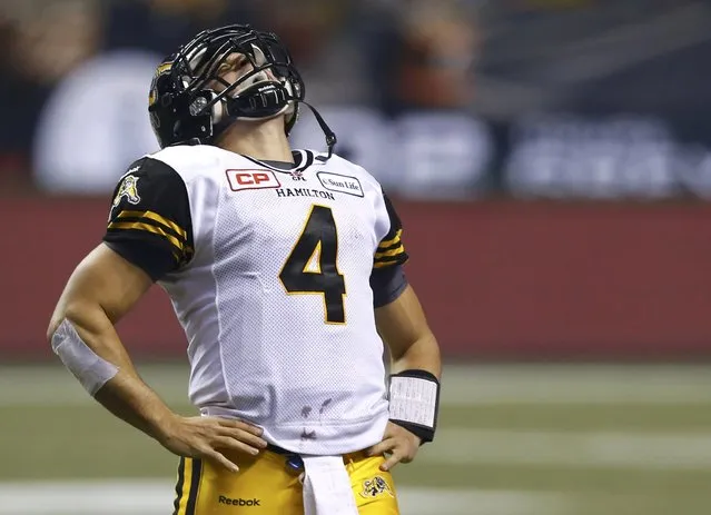 Hamilton Tiger Cats' quarterback Zach Collaros reacts after a series against the Calgary Stampeders during the second half of the CFL's 102nd Grey Cup football championship in Vancouver, British Columbia, November 30, 2014. (Photo by Mark Blinch/Reuters)