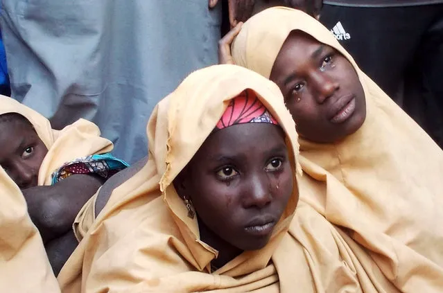 Some of the newly-released Dapchi schoolgirls are pictured in Jumbam village, Yobe State, Nigeria  March 21, 2018. The Nigerian extremist group Boko Haram has allowed almost all of the 110 schoolgirls it took a month ago to go free, but has warned parents: “Don't ever put your daughter's in school again”. (Photo by Ola Lanre/Reuters)