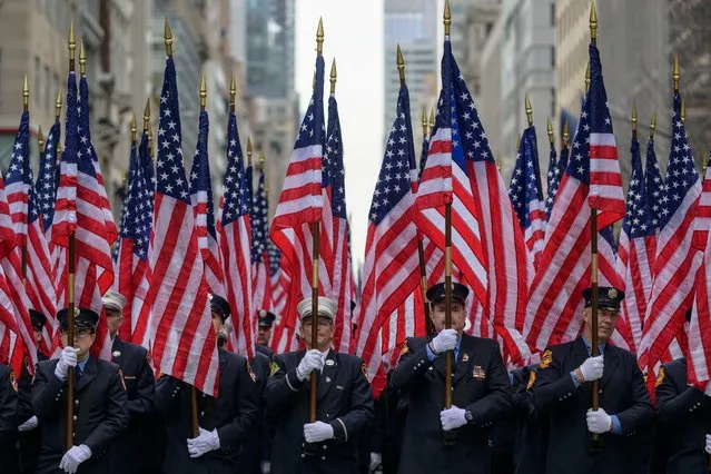 Members of the New York City Fire Department participate in the St. Patrick's Day parade in New York City on March 17, 2023. (Photo by Angela Weiss/AFP Photo)