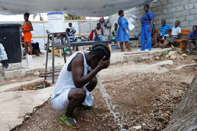 People are treated at a cholera treatment center at a hospital after Hurricane Matthew passed through Jeremie, Haiti, October 11, 2016. (Photo by Carlos Garcia Rawlins/Reuters)
