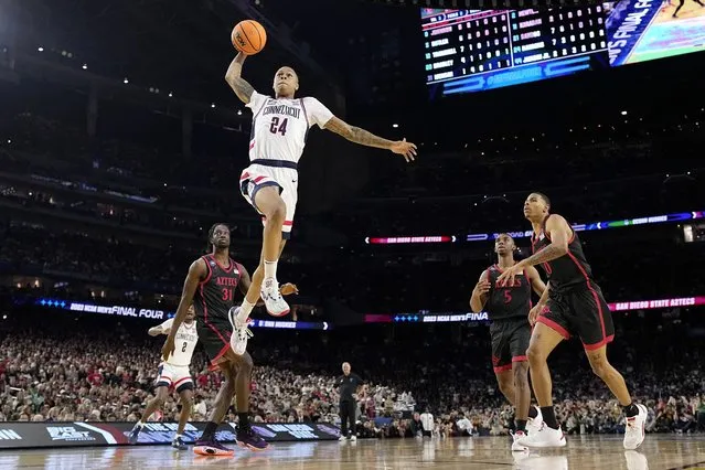 Connecticut guard Jordan Hawkins shoots against San Diego State during the second half of the men's national championship college basketball game in the NCAA Tournament on Monday, April 3, 2023, in Houston. (Photo by David J. Phillip/AP Photo)