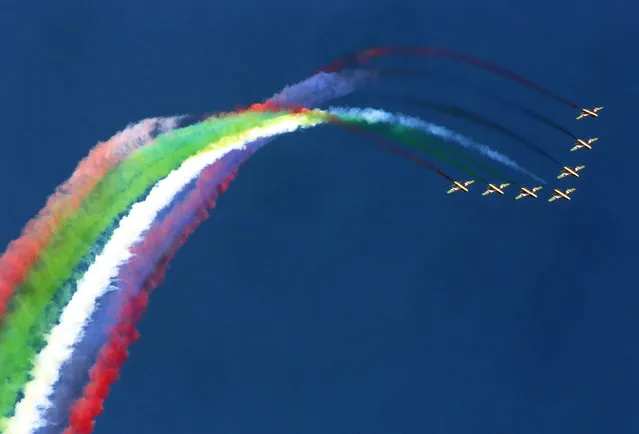 Al-Fursan, the United Arab Emirates Air Force display team, paints the sky with MB339 aircrafts during the Kuwait aviation show in Kuwait City on January 16, 2020. (Photo by Yasser Al-Zayyat/AFP Photo)