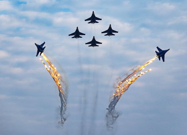 Russia's “Warriors” aerobatic team performs in the sky during the 2025 Nanchang Air Show and Aviation Industry Expo at Yaohu Airport on October 31, 2025 in Nanchang, Jiangxi Province of China. The 2025 Nanchang Air Show and Aviation Industry Expo kicked off on October 31 in Nanchang, showcasing cutting-edge aviation technologies. (Photo by VCG/VCG via Getty Images)