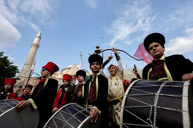 Mehter band of Uskudar Hakki Demir Imam Hatip High School perfom in front of the Hagia Sophia Grand Mosque to mark the 570th anniversary of the conquest of the city by Ottoman Turks, in Istanbul, Turkey on May 29, 2023. (Photo by Murad Sezer/Reuters)