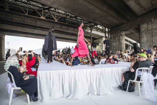 Models present creations from the Fall/Winter 2018/19 Haute Couture collection by Georgian designer Demna Gvasalia for Vetements during the Paris Fashion Week, in Paris, France, 01 July 2018. The presentation of the Haute Couture collections runs from 01 to 05 July. (Photo by Christophe Petit Tesson/EPA/EFE)