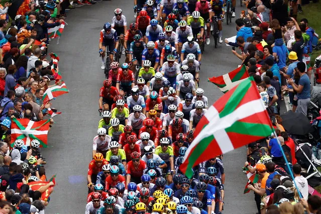 The peloton competes during stage 2of the Tour de France cycling race over 209 kilometers (130 miles) with start in Vitoria Gasteiz and finish in San Sebastian, Spain on July 2, 2023. (Photo by Stephane Mahe/Reuters)